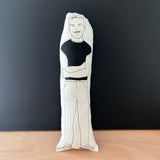 Black and white illustrated fabric cushion doll featuring Irish actor, Andrew Scott.