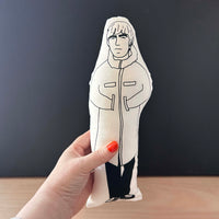 Black and white cushion doll featuring an illustration of Liam Gallagher.