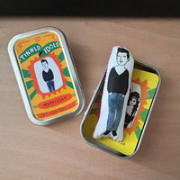 Mini illustrated fabric doll gift featuring singer songwriter Morrissey, with a keepsake tin.