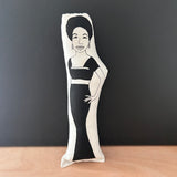 Black and white illustrated fabric cushion doll featuring singer songwriter, Nina Simone.