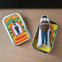 Mini illustrated fabric doll gift featuring Oasis lead guitarist, Noel  Gallagher, with a keepsake tin.