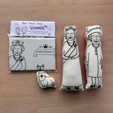 Sew Your Own Queen Elizabeth II cushion craft kit and fabric dolls and mini corgi on a wooden surface
