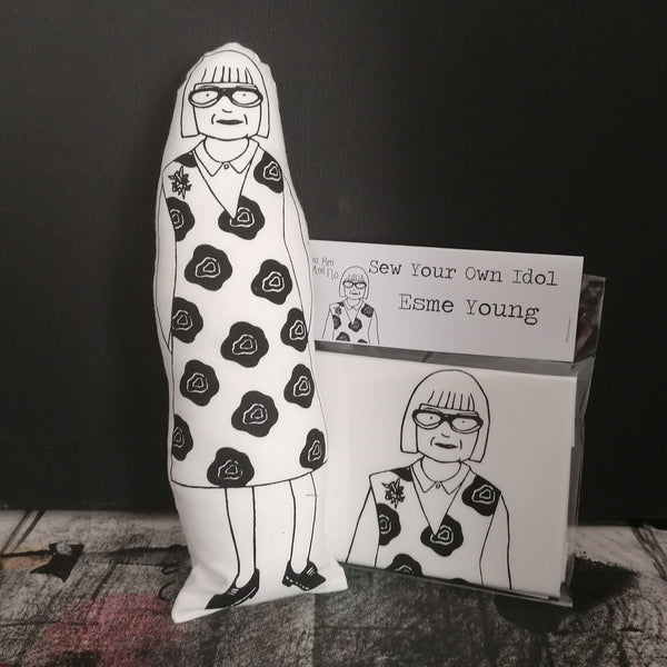 Black and white screen printed doll and craft sewing kit featuring an illustration of The Great British Sewing Bee host Esme Young.