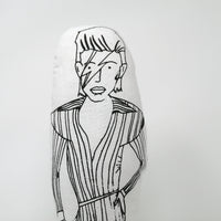 Close up of screen printed David Bowie fabric doll