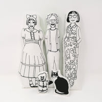 Claire, Grayson and Philippa Perry monochrome fabric dolls with mini Alan Measles and Kevin the cat dolls.