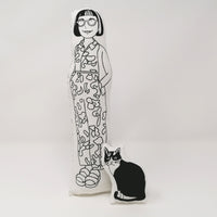 Black and white fabric doll of Philippa Perry and Kevin the cat.