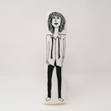 Monochrome fabric Patti Smith doll against a white background.