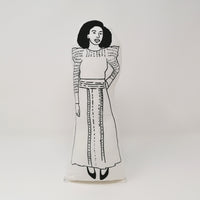 Chimamanda Adichie illustrated screen printed doll on white background.