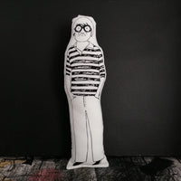 Black and white screen printed fabric doll of painter David Hockney.