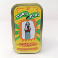 Mini doll in a tin of Gloria Steinem