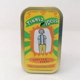 Mini fabric doll of Grayson Perry in a tin