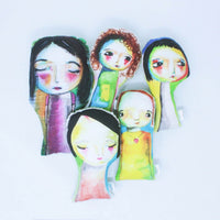 A selection of watercolour illustrated soft fabric dolls named Ramona, Freya, Winnie, Juno and Adeline.