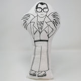 Black and white fabric screen printed doll of Elton John against a white background.
