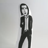 Black and white screen printed fabric doll of Nick cave.