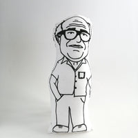 Fabric doll of Danny Devito on a white background