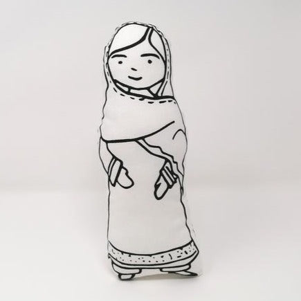 Screen printed monochrome fabric doll of Malala Yousafzai standing against a white backdrop.